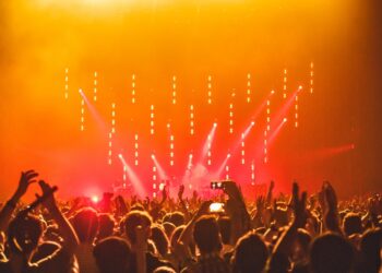 People Enjoying the Concert with smartphone in hand | GRAMHIR