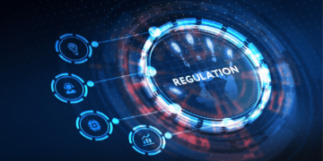 A digital representation of a high-tech interface with a circular element in the center labeled "REGULATION". Surrounding icons, connected to the circle, represent various regulatory aspects such as safety, user profiles, technology, and analytics. The dark background enhances its futuristic design and hints at AI regulation. | GRAMHIR