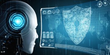 A robotic head with a glowing blue eye looks at a digital interface displaying a shield with a keyhole, representing AI in cybersecurity. The background features various tech symbols and data, emphasizing the theme of artificial intelligence and data protection. | GRAMHIR