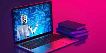A robot points at scientific formulas on a laptop screen beside a stack of books, lit by pink and blue light.